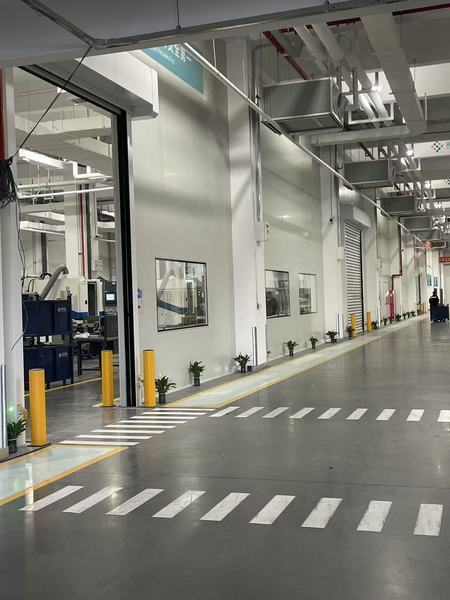 Impact-resistant safety bollards for warehouses